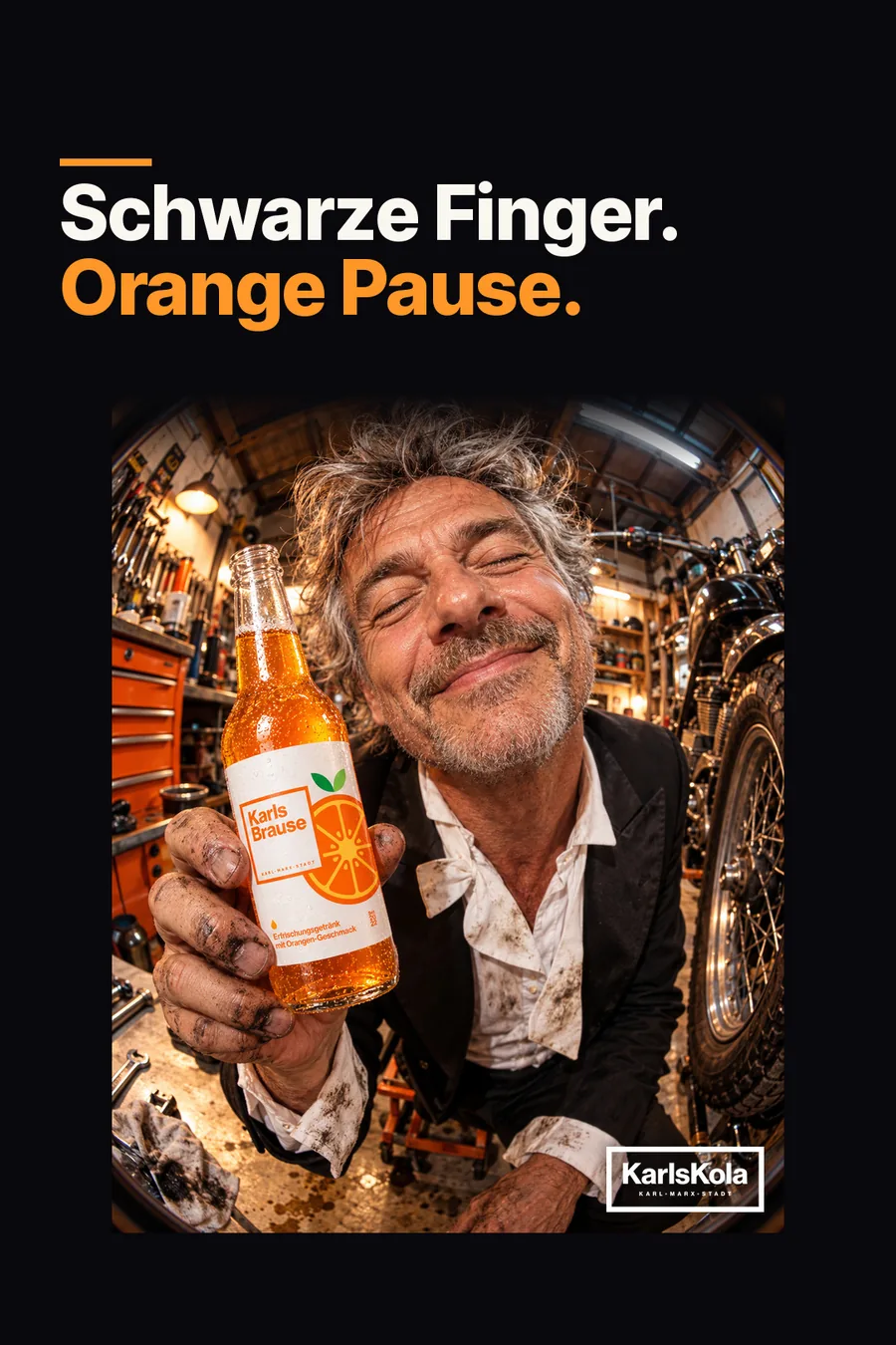 Anzeigenmotiv: Schwarze Finger. Orange Pause.